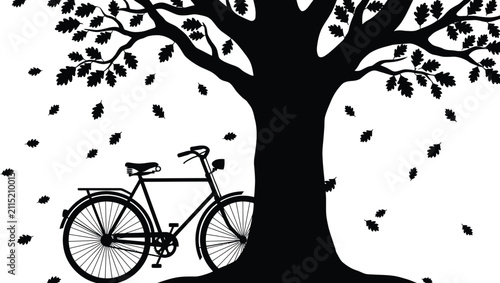 Foto Black silhouette of a bicycle parked under a large oak tree with autumn leaves f