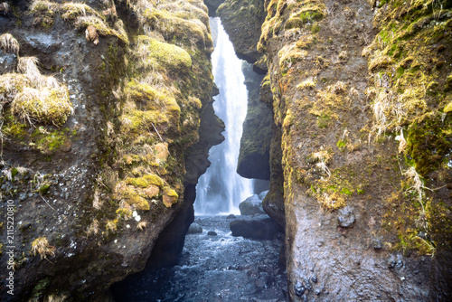 entrance to the Gljufrabui waterfall inside a canyon near Seljalandsfoss on a March day