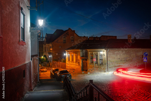 Evening street of Uzhhorod city in Ukraine, cityscape at blue hour