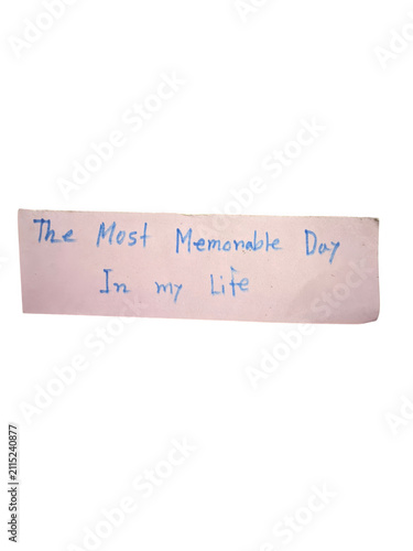 Handwritten note on a small piece of light purple paper