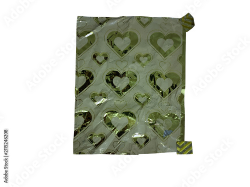 Shiny gold heart pattern on luxury gift wrapping paper