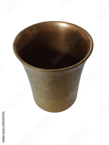 Small empty bronze metal cup for drinking