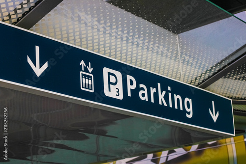 Parking level sign with arrows in airport