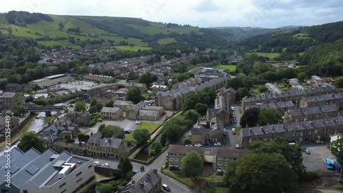 Aerial view of the village of Mytholmroyd in West Yorkshire showing the streets and houses surrounding the river and Rochdale canal
