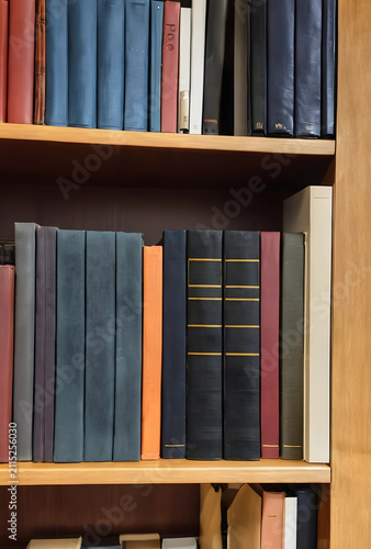 Rows of old hardcover books...