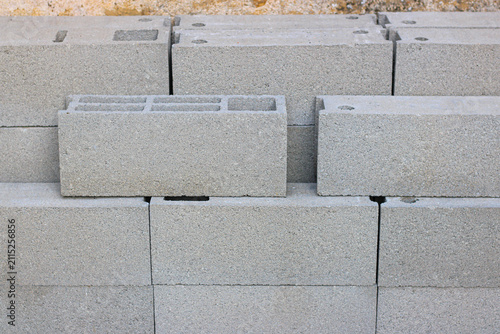 Grey concrete block stack, construction concept