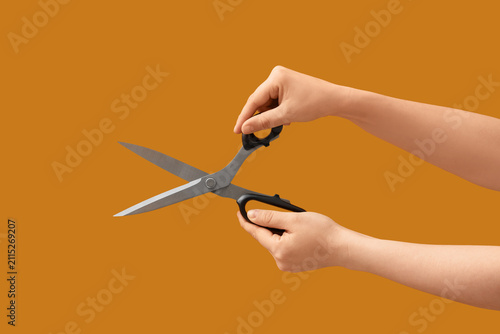 Person holding open a pair ...