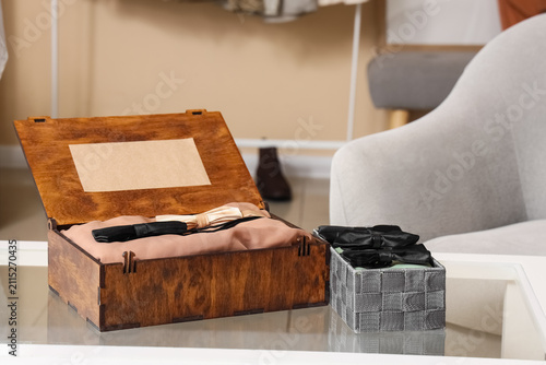 Boxes with bow ties on tabl...