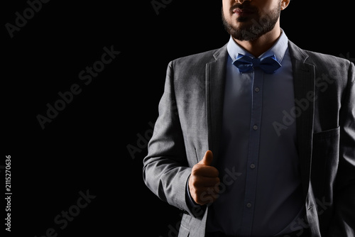 Handsome man in grey suit w...