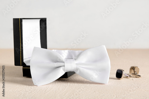 Stylish bow tie and box wit...