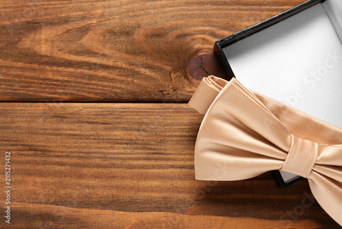 Box with stylish beige bow ...