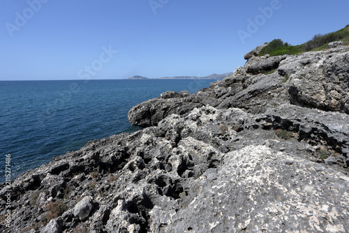 Scenic view of the rocky coast and Mediterranean vegetation along the Porto Cofaniello trail in Gianola Park (Riviera di Ulisse), Italy