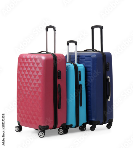 Colorful suitcases isolated...