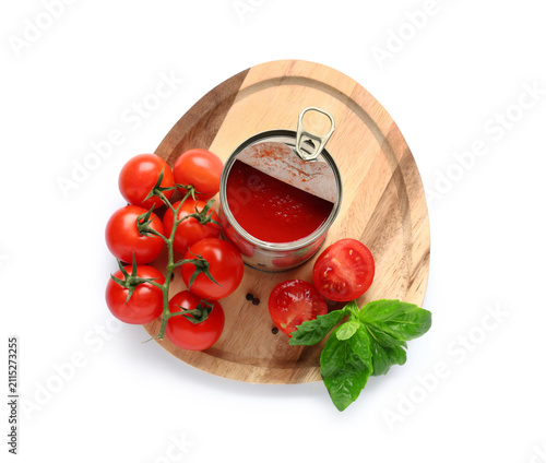 Tin can with tomato paste a...