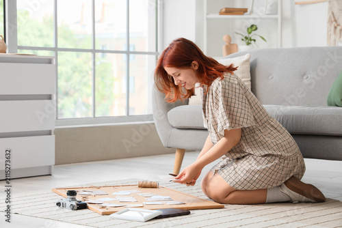 Woman making family tree at...