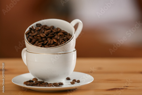 Saucer with cups and coffee...