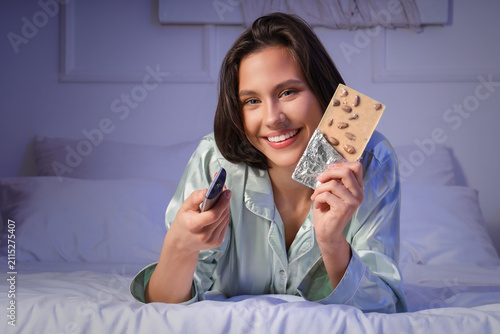 Young happy woman with tast...