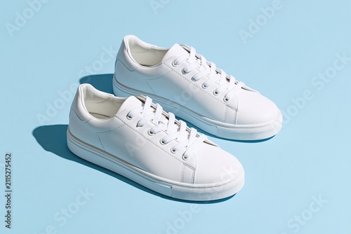 Premium leather sneakers on soft pastel background with clean design for product display