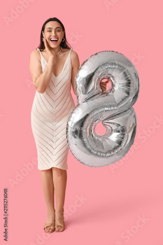 Happy young woman with silv...