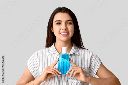 Smiling young woman with mo...