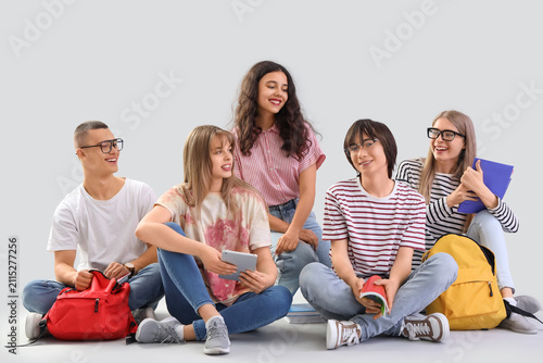 Group of students sitting o...