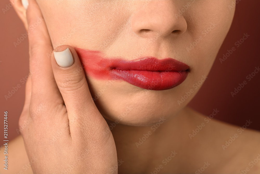 Naklejka premium Woman with red lips on color background, closeup