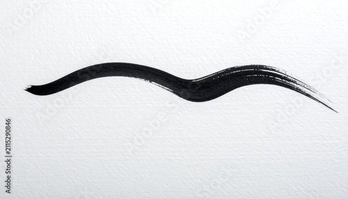 A single, thick, black brushstroke creates a flowing, undulating line on white