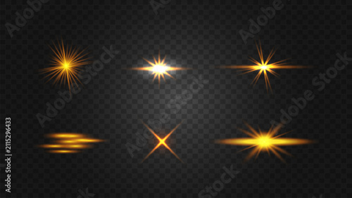 Vector set of glowing golden flashes. Abstract lights and sparkle.
