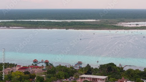 Panoramic sunrise over the iconic blue lagoon in Quintana Roo, Mexico