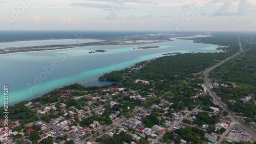 Panoramic sunrise over the iconic blue lagoon in Quintana Roo, Mexico