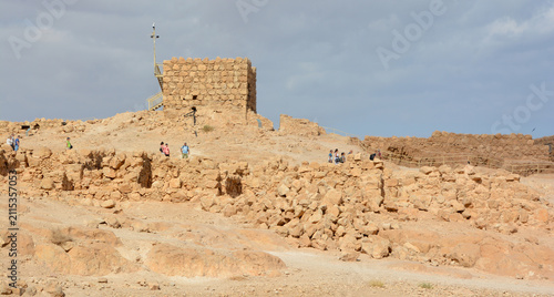 Masada is an ancient fortification in the Southern Israel situated on top of an isolated rock plateau, akin to a mesa. It is located on the eastern edge of the Judaean Desert