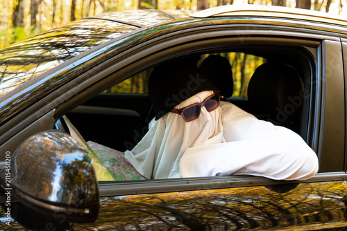 Humorous travel and navigation concept featuring ghostly character attempting to find the correct route during road journey, symbolizing uncertainty exploration adventure and decision making. Seasonal