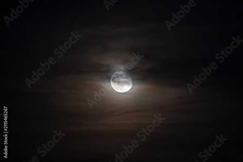 Obraz na plátně Moon through Clouds