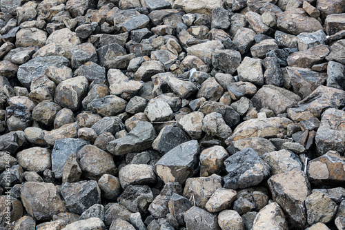 Fotografie A top-down, high-angle shot of a dense pile of large, rugged rocks and boulders
