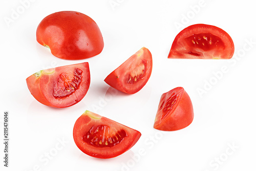 Fotografía Assorted fresh ripened Tomato sections , slices , halves , quarters on white