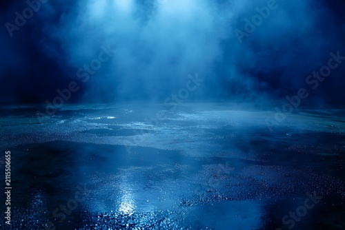 Dramatic blue empty studio backdrop with fog and wet reflective surface for product placement