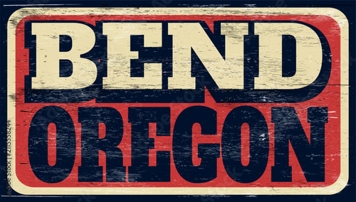Aged and retro Bend Oregon sign on wood