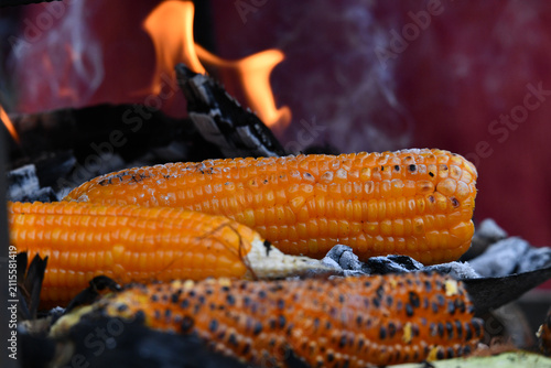 Roasted Corn on Open Fire with Flames and Smoke | Traditional Street Food Close-Up