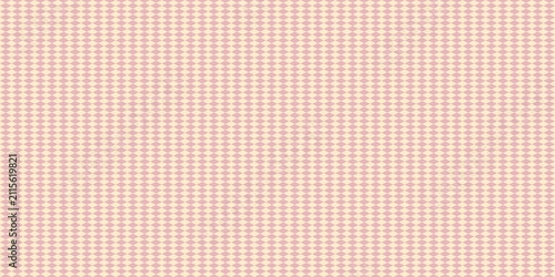 Seamless diamond pattern in soft pink and cream colors. Pastel argyle background. Minimalist harlequin design.