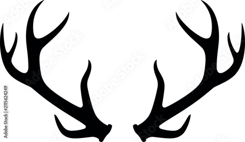 Bild auf Leinwand A symmetrical black deer antler silhouette isolated on a bright white background evokes a majestic wild mood with high contrast