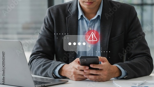 Businessman holding a phone with a password login error and security alert icon