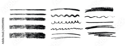 A collection of hand drawn charcoal or pencil strokes and lines isolated on a white background for artistic design and creative projects