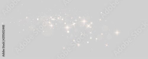 Fairy dust particles glow with golden sparkles and radiant light trails. Magical transparent overlay for festive digital designs. PNG illustration.