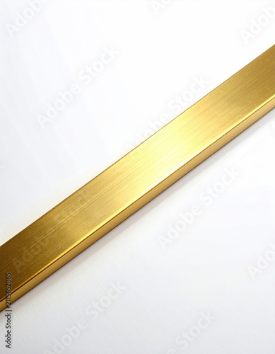 Brushed brass geometric bar with subtle reflections on a white background