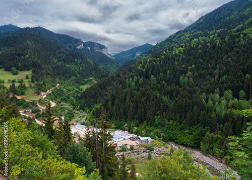 Construction site on the riverbank in the valley