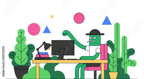 Modern office workspace with computer and potted plant on a wooden desk