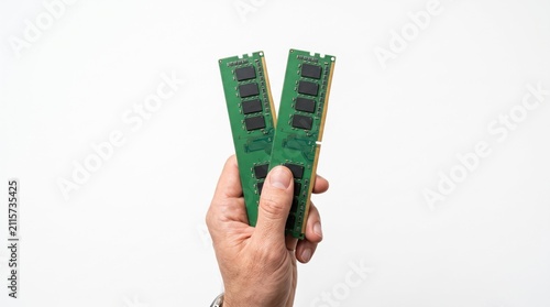 Two RAM modules held in hand