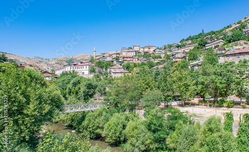 A landscape photograph of the Maden district of Elazığ, built at the foot of a mountain, effectively capturing its distinctive architectural layout.