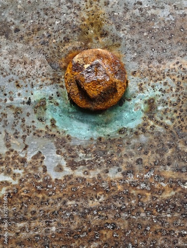 Принти на полотні Rusted metal surface with circular corrosion pit, pitted texture and weathering