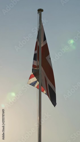 UK Union Jack Flag Waving in Golden Hour Light, Vertical 4K